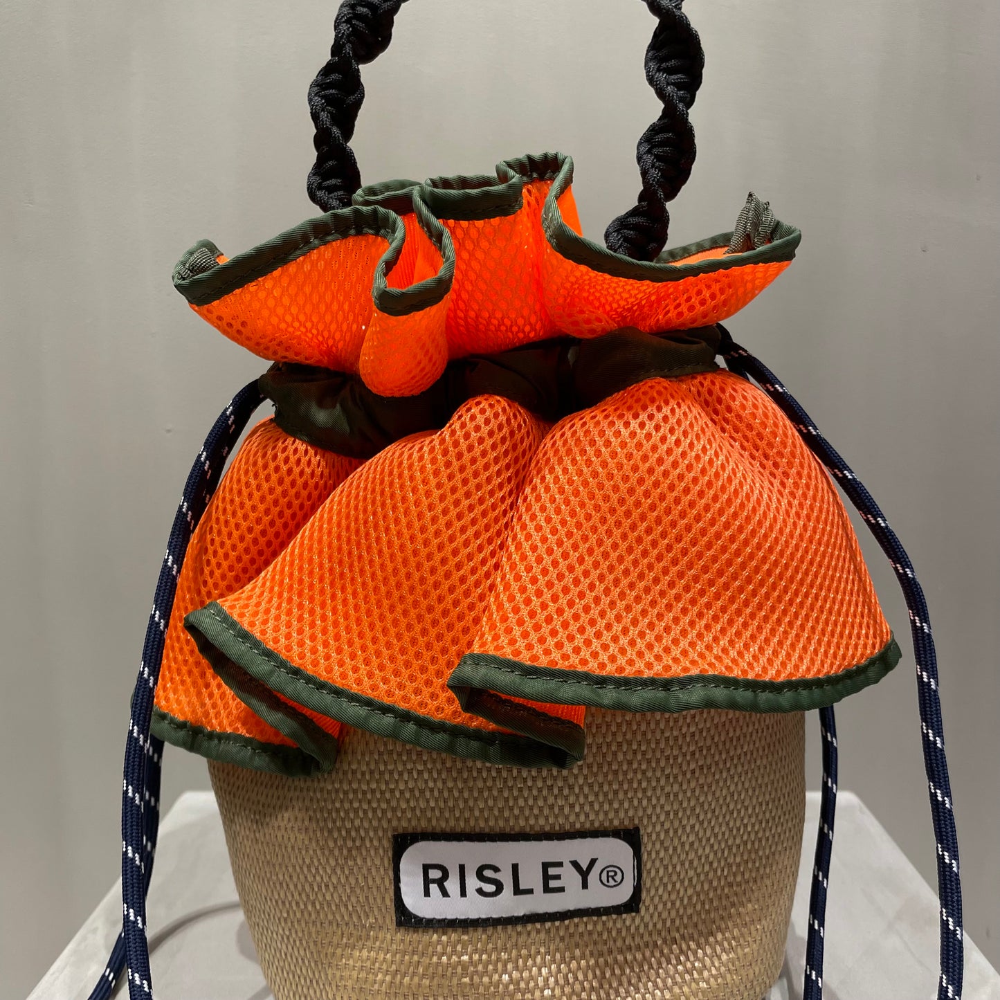 Risley/outdoorコラボ巾着バッグ