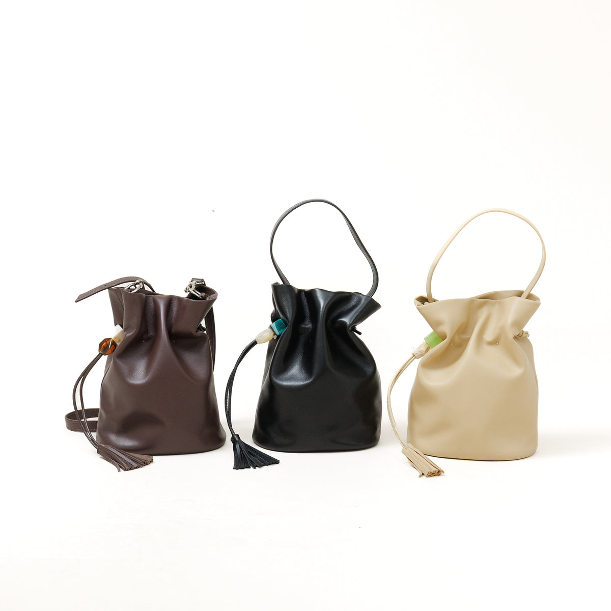 【予約商品】story.(ストーリー)シープレザー ドローストリング ハンドバッグ