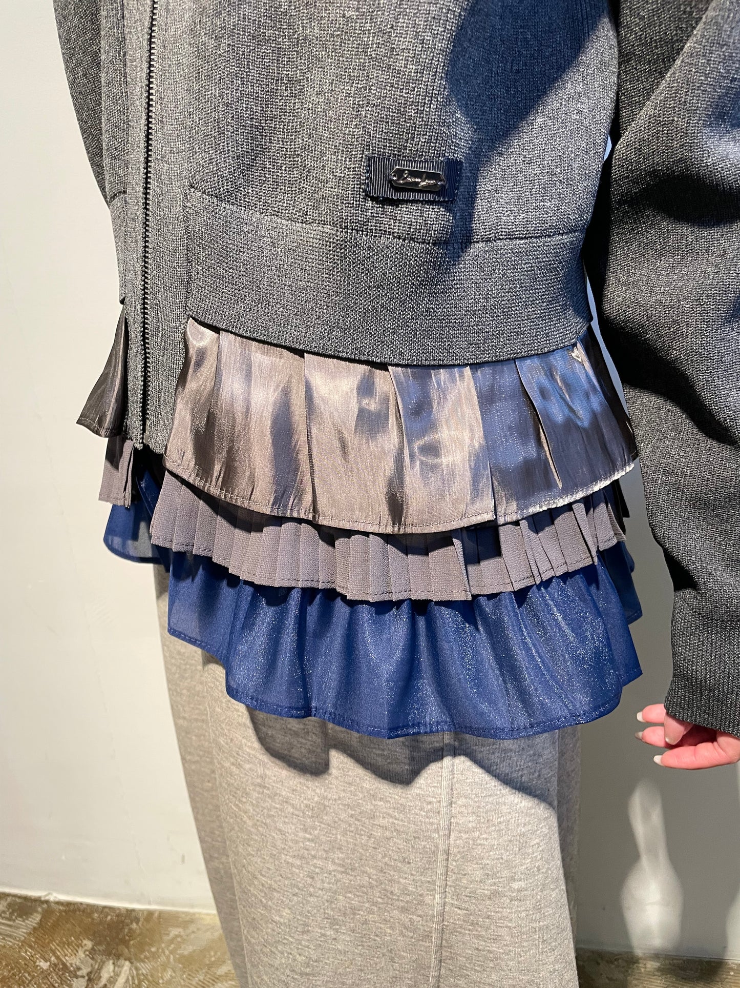 【予約商品】ペプラムフリルニットブルゾン